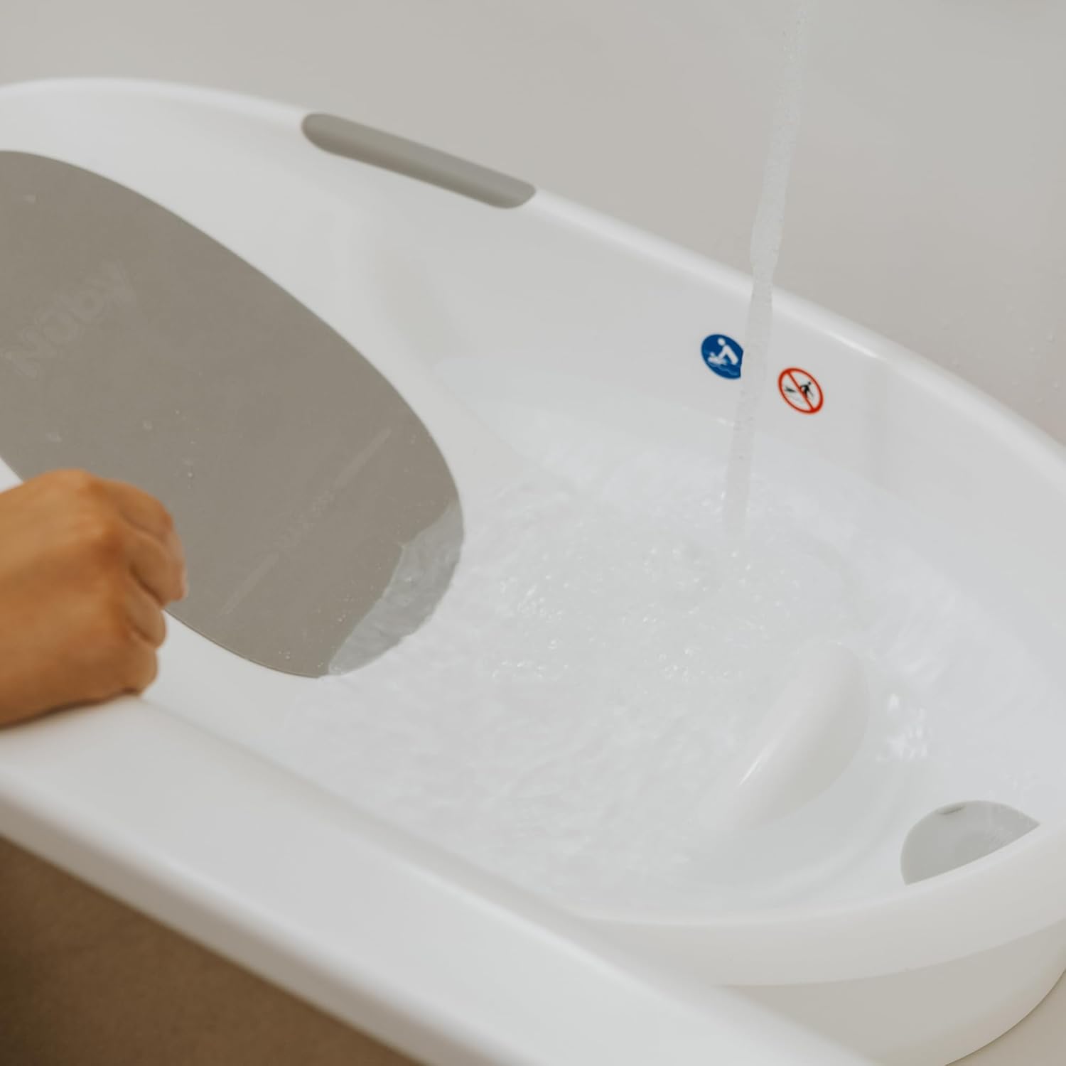 Nuby Newborn Baby Bath with Built in Anti-Slip Support and Soft Headrest, White Bathtub, Suitable from Newborn, White, 1 Count (Pack of 1)